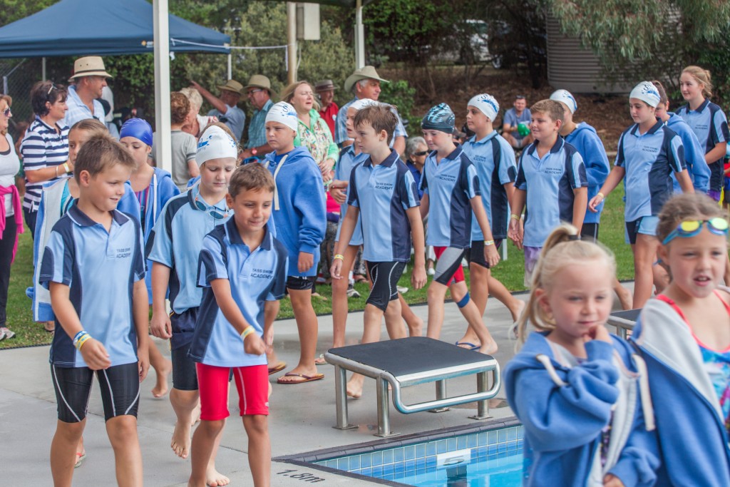 Yass swimmers during their parade before the competition kicked off at Binalong on Saturday.