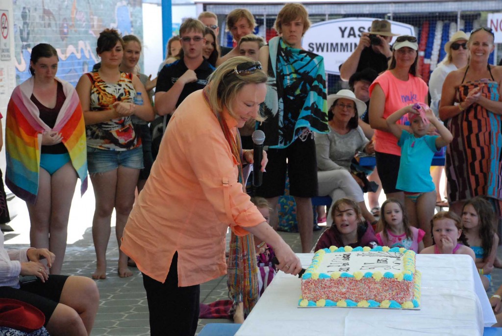 Yass Valley Mayor Rowena Abbey cut the birthday cake amid cheers from the crowd.